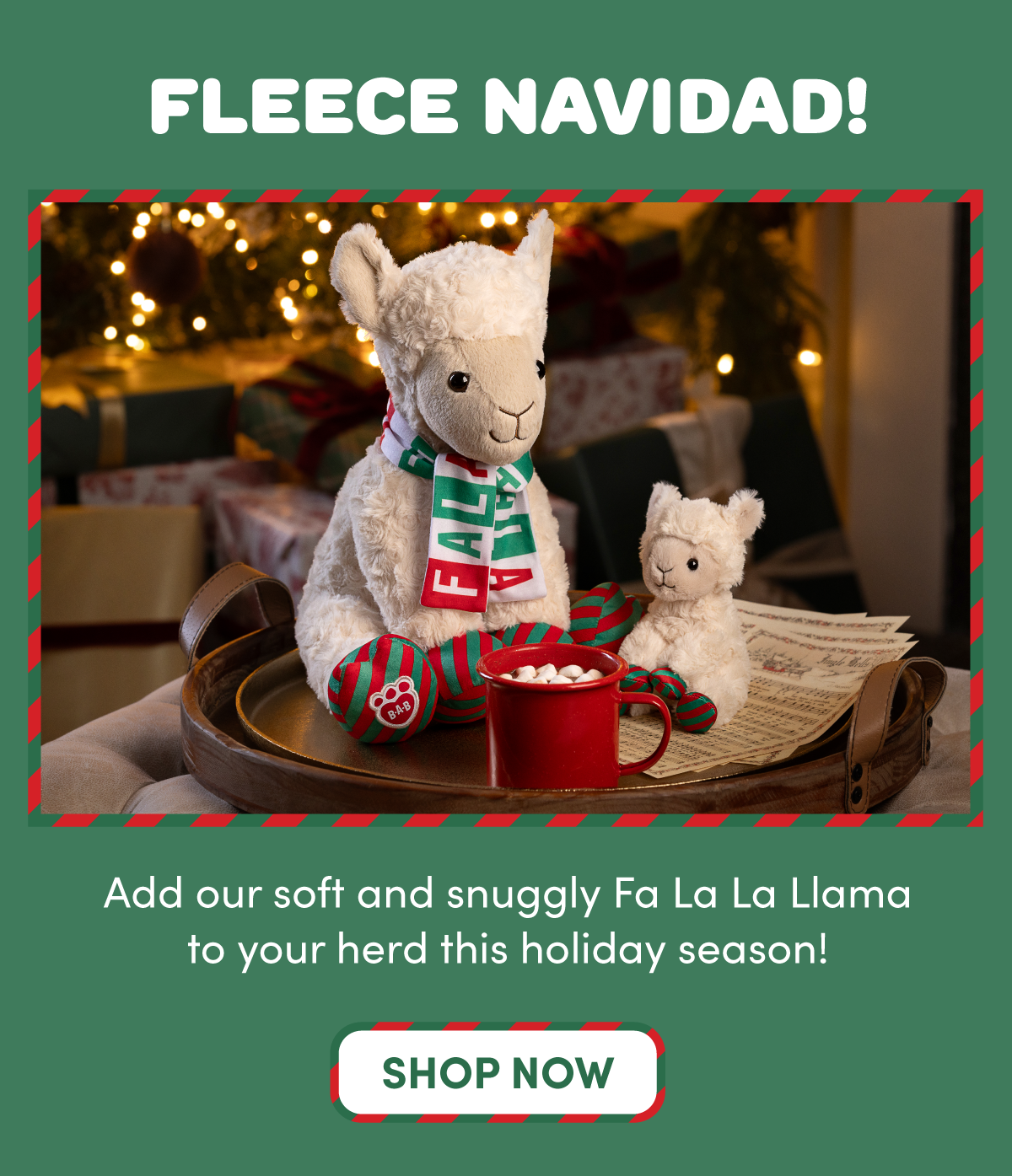 Build-A-Bear holiday graphic featuring a regular size cream-colored llama plush wearing a red, green, and white scarf that reads FA LA LA. The llama sits against a dark green background with festive red-and-green striped hooves visible at the bottom and next to the mini bean version. Text reads FA LA LA LLAMA!, SHOP NOW, and add our soft and snuggly Fa La La Llama to your herd this holiday season! The design highlights a cozy holiday llama plush and festive seasonal style.
